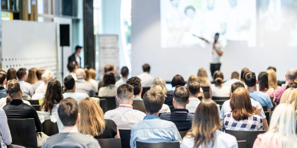 Conference with Chicago Motivational Speaker on Stage