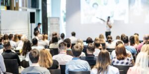 Conference with Chicago Motivational Speaker on Stage