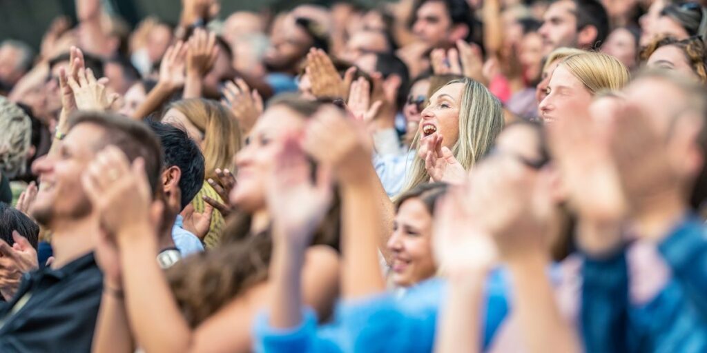 Crowd Cheering for a Chicago Motivational Speaker